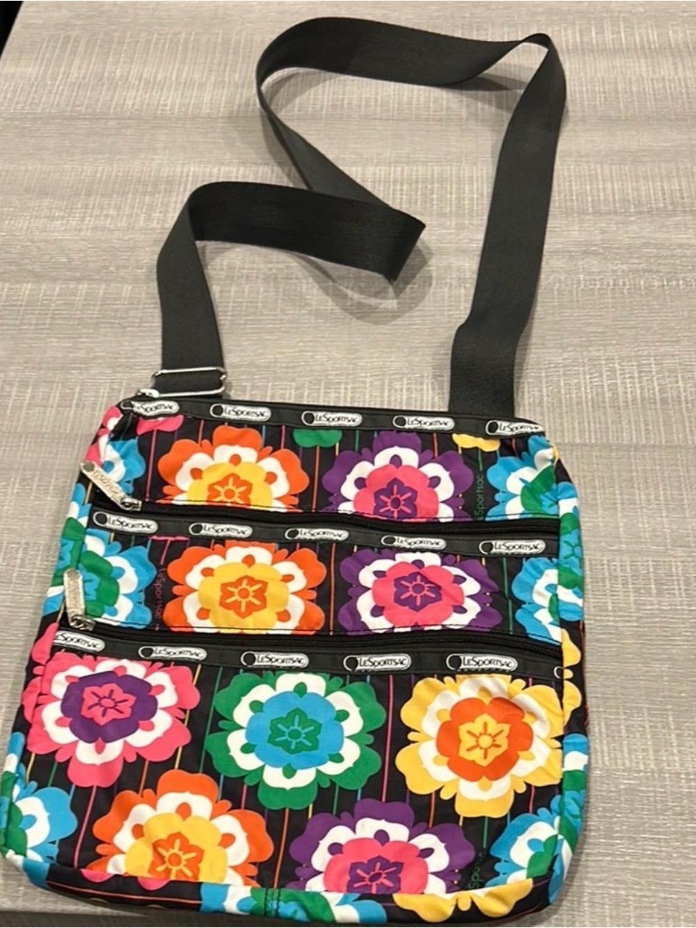 LeSportsac Floral crossbody colorful bag with. 3 compartments. Brand new!